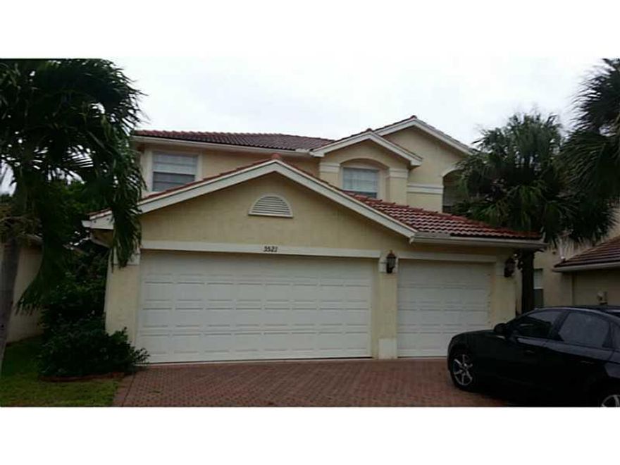 Large beautiful 5 bed/3ba. 3 car gar, in a desired gated community "Nautica Isles". Almost 3,000 Sq. Ft. under A/C, a big enclosed screened patio with gardens and waters peaceful views right in your backyard. Spacious home, maple kitchen - granite counter  top, stainless steel appliances, ceramic/tile throughout 1st level, carpet throughout 2nd level, vaulted ceiling, the entire house is in excellent condition for a very low price in this desirable community. Do not missed the opportunity.