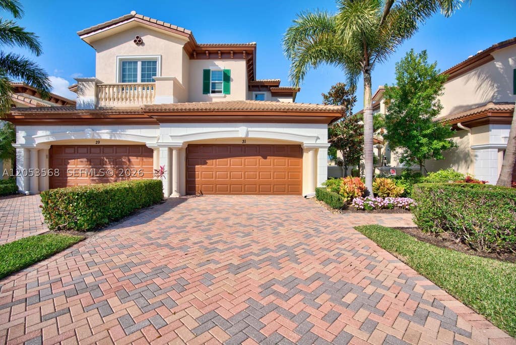 Photo of 111 Tresana Blvd #31, Jupiter, FL 33478 (MLS # A12053568)