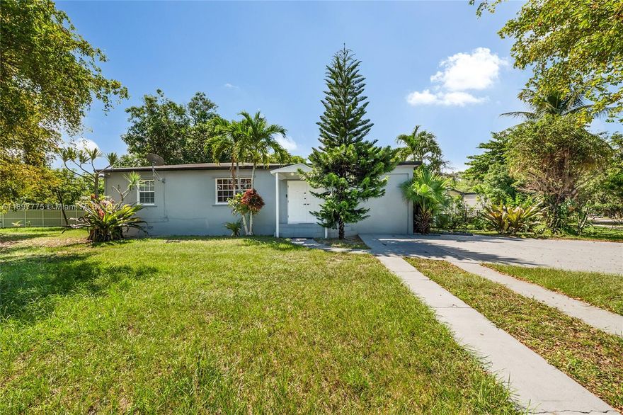 Beautiful single-family home in the heart of North Miami! This corner lot 2-bedroom, 1-bath home sits on an oversized 10,000 sq ft lot, fenced yard with mature trees, and plenty of parking located east of Biscayne Blvd near schools, shops, parks, and 8 mins away from the beach. Zoned for single-family use with potential for expansion or redevelopment. *Includes an efficiency with it's own private entrance, walk-in closet, kitchen and bathroom; ideal for extra income or in-law quarters*