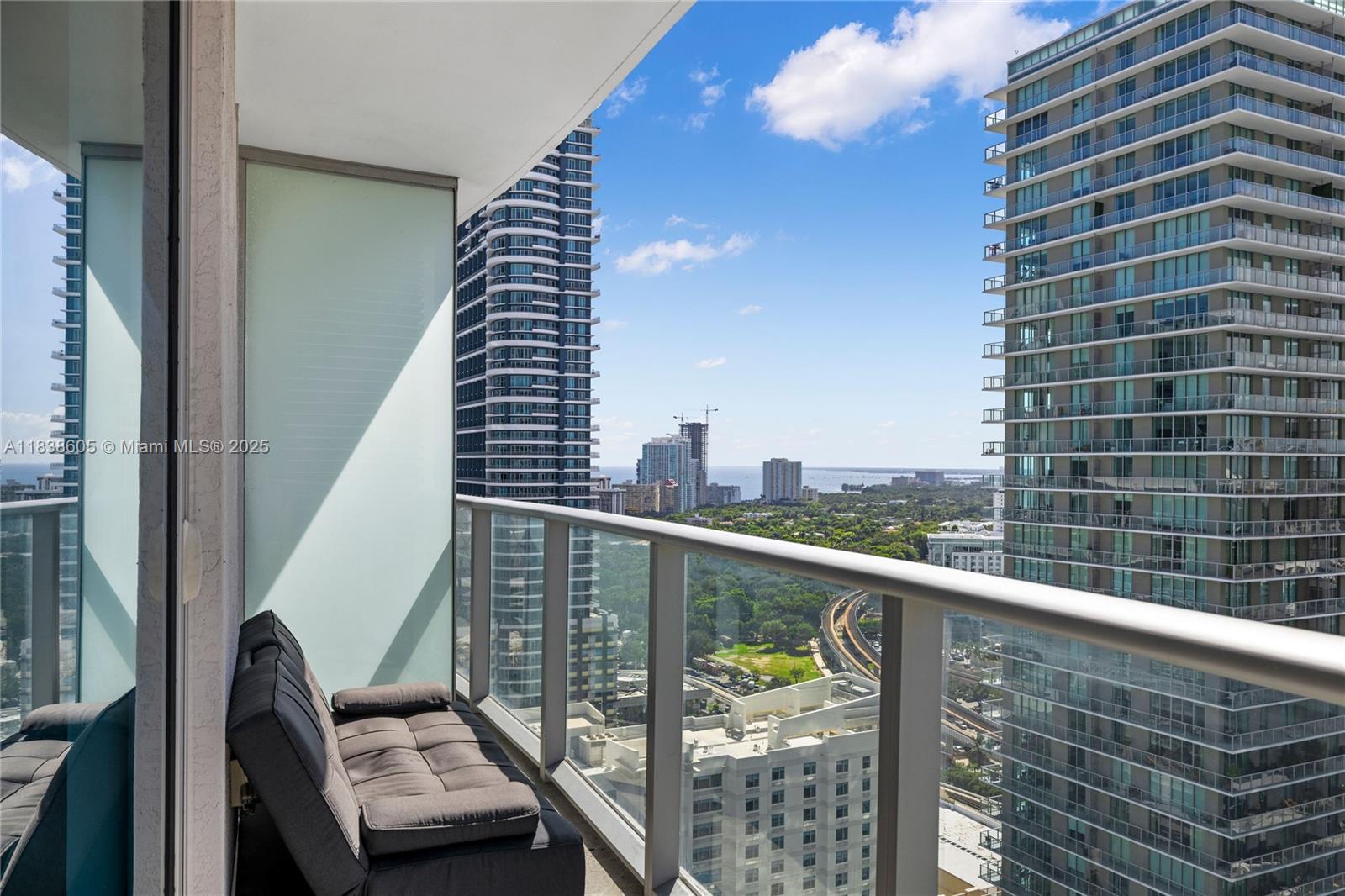 Experience luxury living in this amazing studio at Millecento this high-rise unit has been freshly painted and features new laminate flooring with the carpet fully removed offering a modern, sophisticated feel. The upgraded interior boasts Italian cabinetry and premium appliances, blending style and functionality. Step out onto a spacious balcony and enjoy breathtaking skyline and bay views. Indulge in 5-star amenities with Rooftop pool on the 43rd floor, Lounge room and kids' room, Movie theater, State-of-the-art fitness center and sauna. Nestled in the vibrant heart of Brickell, you're just steps away from top-tier restaurants, bars, and entertainment. Available for immediate occupancy
