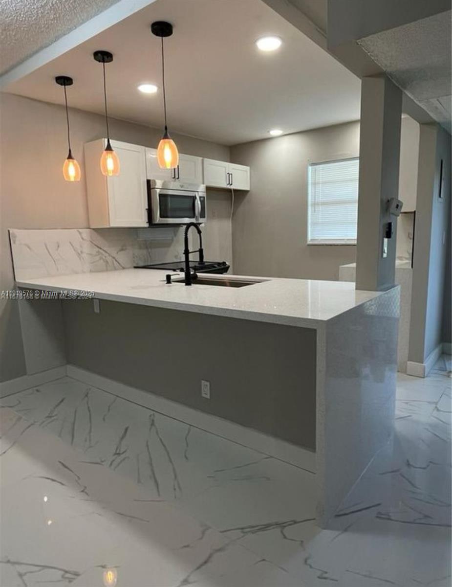 ELDERBERRY GARDENS CONDO - Residential