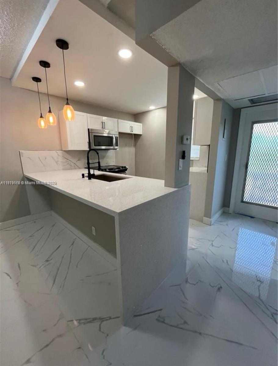 ELDERBERRY GARDENS CONDO - Residential