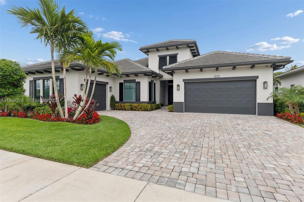 Photo of 9228 Coral Isles Cir, Palm Beach Gardens, FL 33412 (MLS # A11898278)