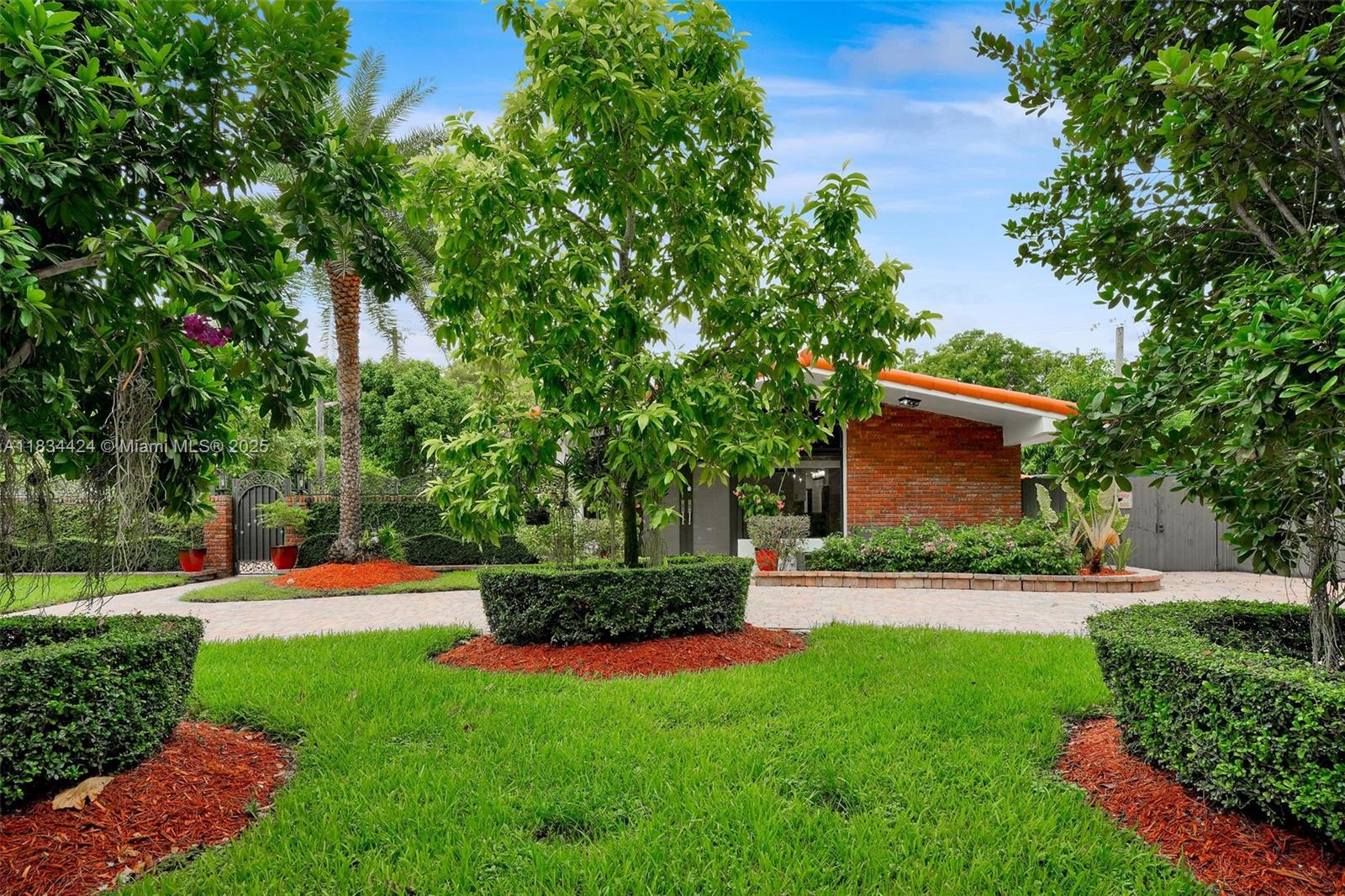 ALL INCLUSIVE RENT COVERS: Electricity, water/sewer, monthly pest control, bi-weekly landscaping & Internet. Move right in & enjoy perfection. Located in a true sanctuary of peace & quiet, surrounded by immense trees, lush landscaping, lots of fruit trees that create a natural haven. Fully remodeled including new kitchen, new bathrooms, elegant travertine floors, high impact windows & doors, smart shades & blackout in bedrooms & smart shades on all other windows & doors. 3 bedroom/2 bathrooms, Laundry room, Pantry, induction stove, vented exhaust system to the outside, 2 full refrigerators, dishwasher, under the counter microwave, washer & dryer, separate laundry room, shed, 8X12 doghouse w/automatic water dispenser, generator, built in outdoor fire pit, fully fenced, outside lighting,