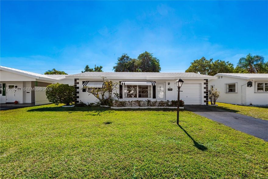 Fabulous Affordable South Florida Home in a lovely quiet 55+ Community. Brand new 2025 roof, a $25,000 value with warranty to transfer. Kitchen has been opened up to the living area and has brand new stainless appliances. Walking distance to the pool, and not backing up to the I95, on a quiet street makes this very desirable. Community has 2 pools, a par 3 golf course, shuffleboard, 2 club houses and an exercise room. Management is on site. Low HOA fee $310 m includes water, lawn care, sprinklers and outside house painting. There is also a small monthly Land lease fee $106.12  Close to beach, restaurants, shopping and I95.