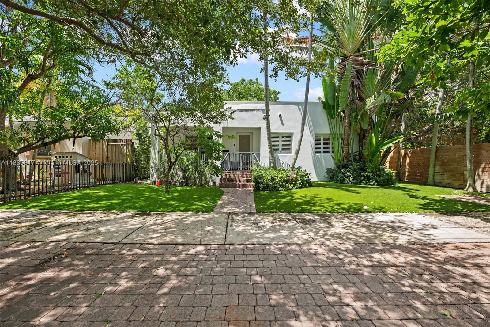 Step into this beautifully renovated 2-bedroom, 2-bathroom home in the heart of Coconut Grove. Designed with a thoughtful split floor plan, this residence features high-end finishes, top-of-the-line appliances, and elegant plantation shutters throughout. Hurricane impact windows provide peace of mind, and the fully fenced, turfed yard is perfect for entertaining or relaxing outdoors. A charming front porch adds to the home’s curb appeal. Situated on a quiet, tree-lined street just moments from the Marina, CocoWalk, and the Grove’s top dining and shopping.