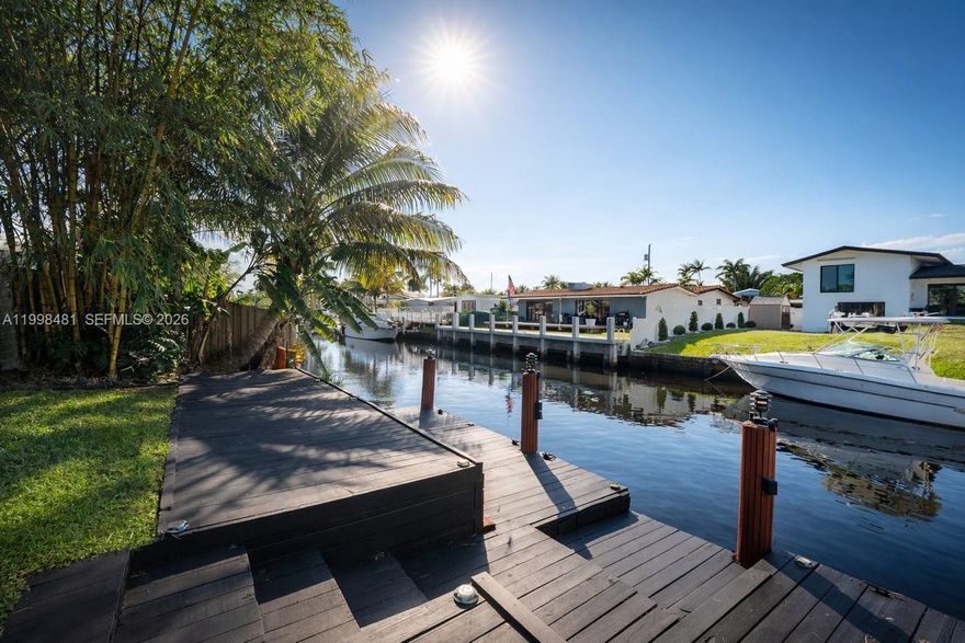 Experience the ultimate South Florida lifestyle in this stunning waterfront residence located in the heart of Lauderdale Isles. This 3-bedroom, 3-bathroom gem offers 1,866 sq. ft. of bright, modern living space situated on an expansive 7,491 sq. ft. lot. Perfect for avid boaters, the property features a 55-foot private dock with no fixed bridges, providing unrestricted ocean access for vessels of all sizes.

The interior is move-in ready, boasting brand-new appliances, new ceiling fans, and beautiful updates throughout. Step outside to your private backyard oasis, complete with a relaxing hot tub and dedicated areas designed for hosting guests and  gatherings. Whether you're setting sail from your backyard or enjoying a quiet evening by the water, this home is the perfect retreat. Ready to rent and easy to show and bring your boat to this Lauderdale Isles paradise!