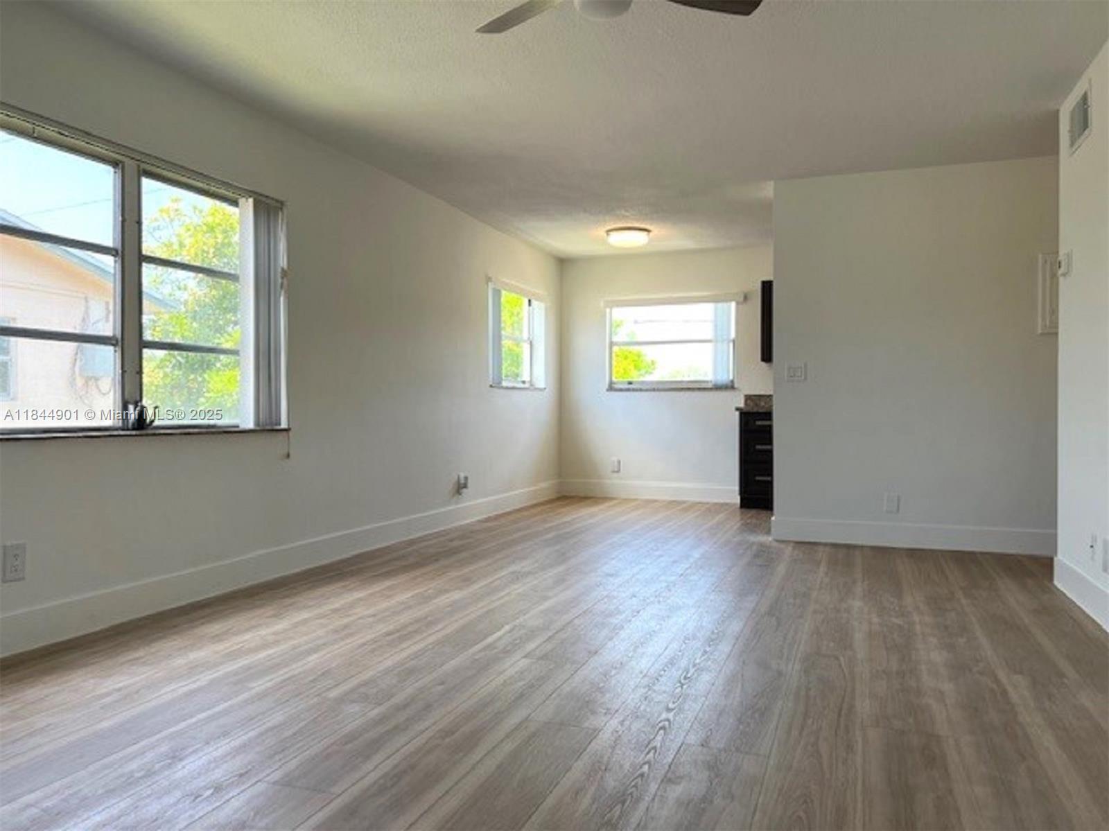 LIGHT, BRIGHT and AIRY CORNER 2nd floor 2Br / 1 bath. Refinished terrazzo floors. Remodeled Bath. Central A/C and Heat. Community pool,l Washer and Dryer on the same floor. Close to everything! Good School district too! First month rent, Last month and 1 month security deposit required. Easy to show.