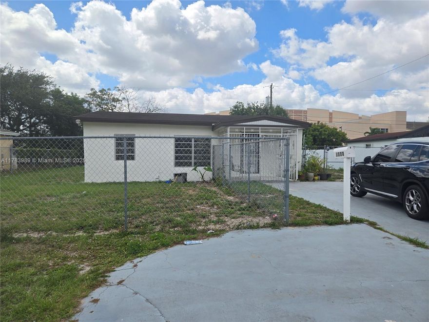 COZY 3 BEDROOM HOUSE IN MIAMI GARDENS.  NEWER KITCHEN CABINETS, ALL TILED, LARGE FENCED YARD, CENTRAL AC, MINUTES TO SHOPPING PLAZAS, GAS STATION, BANKS, WALMART, GYM, TURNPIKE AND I95 ! GREAT LOCATION WHETHER YOU WORK IN BROWARD OR DADE.  SECTION 8 WELCOME !