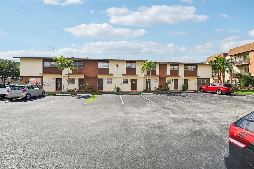 Renovated and Remodeled Charming modern two-story corner townhouse in a gated community, ideal for a family looking for a dream home or an investor seeking a prime opportunity. This home offers 3 bedrooms, 2 stylishly updated bathrooms with glass shower doors, spacious closets, and a bright, open floor plan with porcelain floors. Enjoy the convenience of in-unit laundry and assigned parking in front of your front door, all within walking distance to shopping, FIU, and nearby malls. Community amenities include a clubhouse, pool, and sports courts. Don’t miss out on this fully remodeled gem.