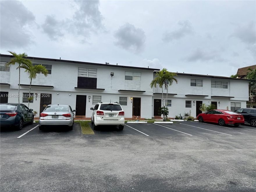 Renovated and Remodeled Charming modern two-story corner townhouse in a gated community. This home offers 4 bedrooms, 2 stylishly updated bathrooms with glass shower doors, spacious closets, and a bright, open floor plan with porcelain floors. Enjoy the convenience of in-unit laundry and assigned parking in front of your front door, all within walking distance to shopping, FIU, and nearby malls. Community amenities include a clubhouse, pool, and sports courts. Don’t miss out on this fully remodeled gem.