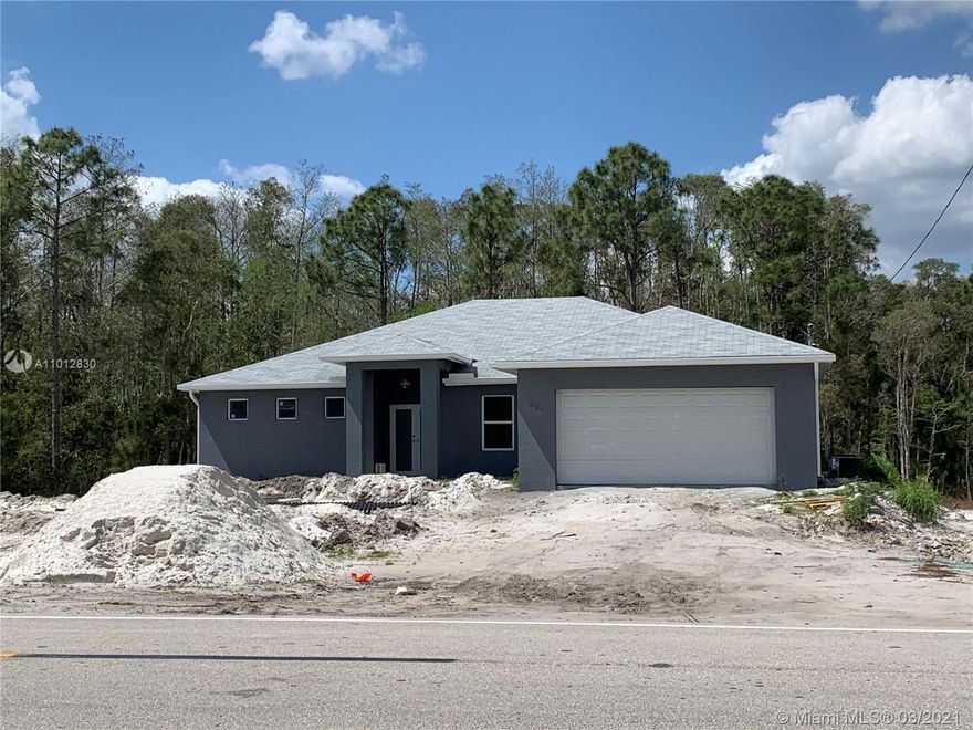 This beautiful 4 Bed + Den, 2 bath home features a spacious open floor-plan, screened paved lanai. 2,135 SqFt under air, high-efficiency HVAC system, 2,854 SqFt total. Modern kitchen, custom soft close cabinets, quartz countertops, wine cooler fridge, stainless steel appliances, range with cooktop, refrigerator, dishwasher, built-in microwave, large island offering plenty of space. The Spacious Master Bedroom offers dual walk-in closets and double sinks, large shower, and tub. Washer, Dryer connection, tile throughout the entire home, hurricane impact windows, rain gutters, garage door opener and so much more. Oversized lot allows for the construction of a future pool. Construction completion projected within the next 30 to 45 days.