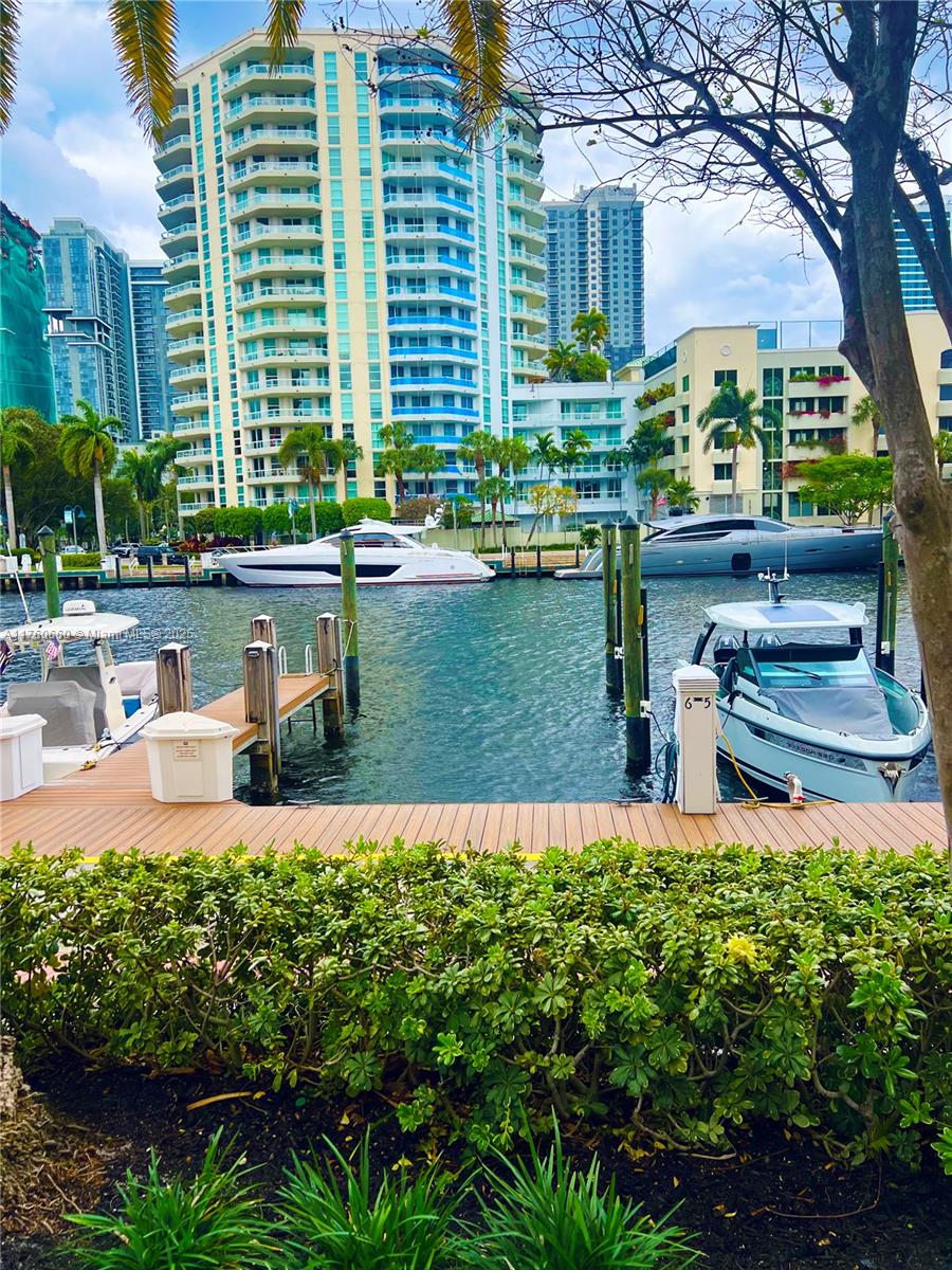 Boat Dock # 6 available for sale at The Marina at The Symphony on New River in Fort Lauderdale. Dock ownership is restricted to owners at The Symphony Condominuim only. Available for use by owners or tenants. Perfect in town location with modern docks, the amenities at each slip are: 30 & 50 Amp metered electric; Internet-ready cable TV, water, pump out, electric, dock box. 40' slips with beams up to 17-feet, six-foot draft at MLW, slip fendering, 4' wide finger piers w/ concrete piles & pressure-treated wood decking. No Fixed Bridges. Easy access to restaurant hopping, intercoastal, New River and ocean access. Valet service provides docking assistance. Area is monitored by security cameras around-the-clock.