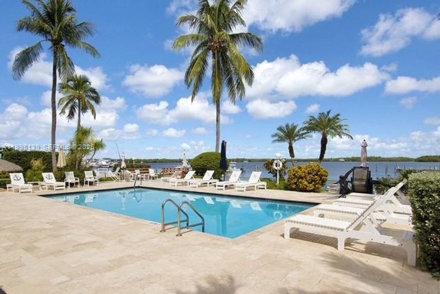 Beautiful Bayfront Townhome with Sunset Views & Boat Slip - MM 92 Immaculate 2-bedroom, 2,5-bath townhome offering stunning open bay views and spectacular sunsets in a prime location at MM 92, perfectly situated between Key Largo and Islamorada. This beautifully maintained home features high-end finishes throughout and an open, light-filled living space designed to capture the incredible waterfront views. Relax by the community pool or enjoy boating with your 28' boat slip. Water and electric included. In the summer the docks will be under construction so there will be approximately a two-month period without dock access/ $200.00 credit given during that time. Located close to shopping, restaurants, and the hospital, this home offers the ideal blend of luxury, comfort, and convenience in the Florida Keys.