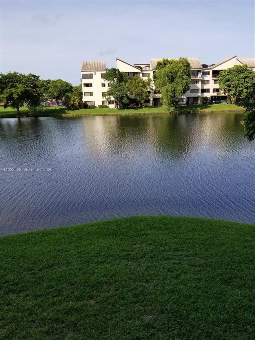 THIS BEAUTIFUL AND SPACIOUS 1400 SF CORNER UNIT CONDO AT THE ATRIUMS -  2 BEDROOMS 2 BATHROOMS TILE FLOOR THROUGOUT WITH ALL THE WINDOWS FACING THE LAKE . LARGE KITCHEN WITH A SLIDING GLASS DOOR GOING TO THE BALCONEY WHICH FACES THE LAKE.  IT'S A SIGHT TO SEE... PLUS GREAT AMMENITIES.  SECURE GUARD GATE AND BUILDING.  MAINTENANCE INCLUDES CABLE TV, HIGH SPEED INTERNET, WATER AND INSURANCE . MOTIVATED SELLER.  CALL LISTING AGENT FOR SHOWING.