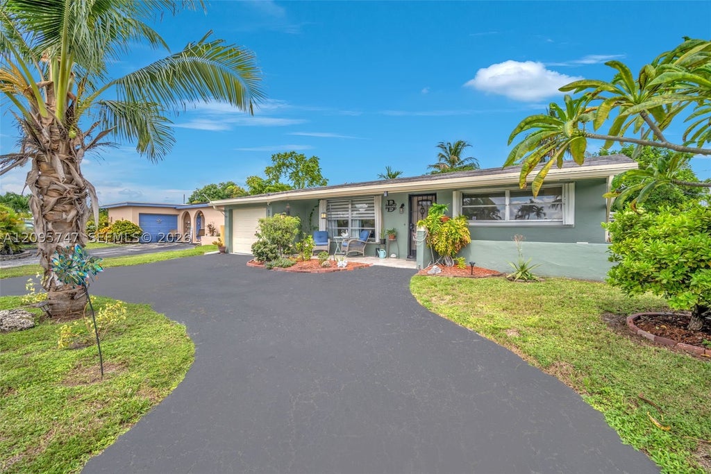 Photo of 9261 NW 24th Pl, Sunrise, FL 33322 (MLS # A12095747)