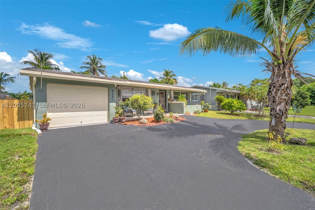 Photo of 9261 NW 24th Pl, Sunrise, FL 33322 (MLS # A12095747)