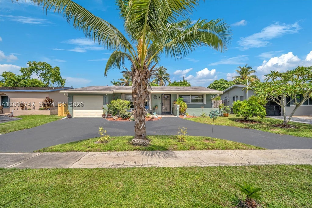 Photo of 9261 NW 24th Pl, Sunrise, FL 33322 (MLS # A12095747)