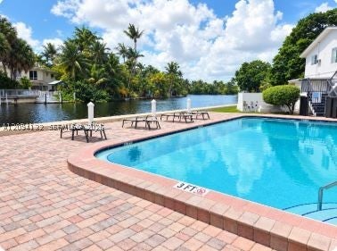 Photo of 1816 E Oakland Park Blvd #78, Oakland Park, FL 33306 (MLS # A12094132)