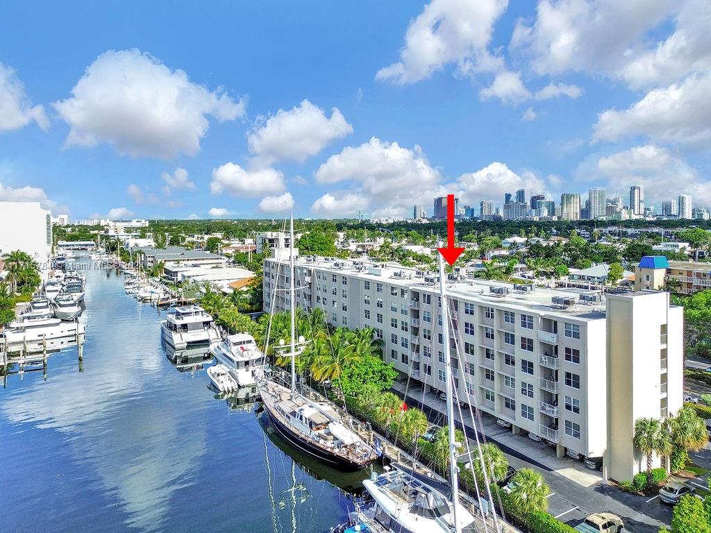 Experience modern living in this fully renovated 2BD/2BA condo in Fort Lauderdale's prime location! Enjoy a spacious layout with vinyl flooring, quartz countertops, and stainless steel appliances. Relax on your private balcony or take advantage of the in-unit washer/dryer and finished closets. Impact windows/doors offer tranquility. The gated community features a pool overlooking the Intracoastal, gym, sauna, and guest parking. Just minutes from Las Olas, Whole Foods, I-95, and the beach. Stroll to waterfront dining at 15th Street Fisheries. Full reserves, rentals allowed after 1 year, and HOA covers cable, internet, water, sewer, trash, exterior insurance, and more. Ideal for comfort and convenience!