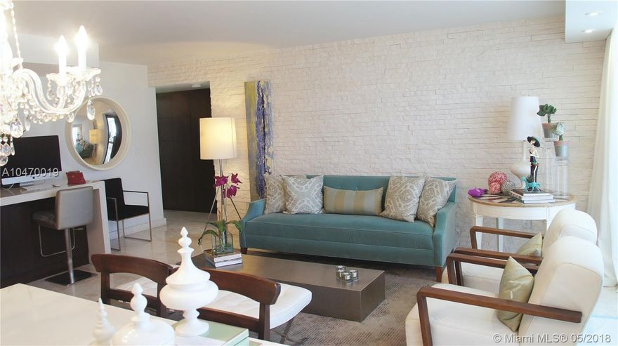 Completely remodeled luxury contemporary designer decorated apartment. A gem at a Boutique Building in Key Biscayne, close to restaurants and shops. Custom high end kitchen with top of the line appliances. 2 bedroom , 2 full baths, marble floors and  built out wood walking closets.