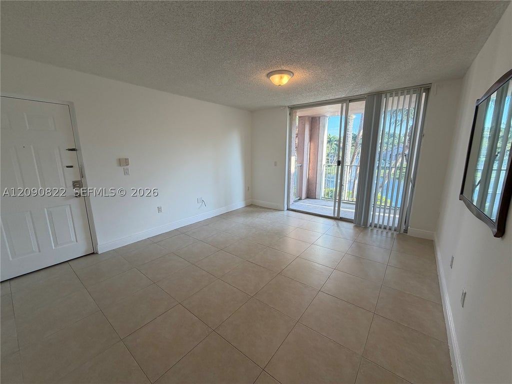 Photo of 12124 Saint Andrews Pl #206, Miramar, FL 33025 (MLS # A12090822)
