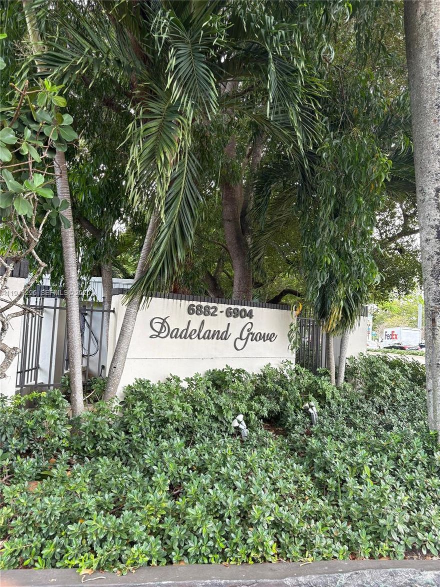 located in prestigious PINECREST!...this unit located in building A at Dadeland Grove, offers proximity to laundry room, elevators, mailboxes and common areas PLUS steps from parking area!..super spacious first floor corner unit with a private fenced patio.  Ample master bedroom & walking closet, bright formal living area and spacious dining area.
wood cabinetry and granite counter tops with wet bar. This one is a MUST see!. community  is all gated with guard and management on site. Premium location!..accross from US1, metro rail station, Dadeland Downtown and famous Dadeland Mall. CAN NOT ASK FOR MORE...