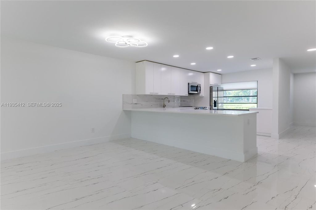 Photo of 8435 Casa Del Lago #22-C, Boca Raton, FL 33433 (MLS # A11935412)