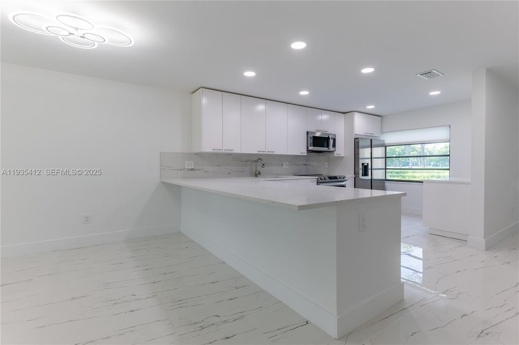Photo of 8435 Casa Del Lago #22-C, Boca Raton, FL 33433 (MLS # A11935412)