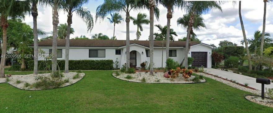 4 bedroom with two baths on full 1/2 acre home with plenty of landscape and block storage/work shed. Wood lament floors thru out and tile in kitchen and Florida room. Updated kitchen and bathrooms.  Come make this home your own.  New impact windows and doors.  AC 2018 with 10 year warranty.  Please make appointment as home is occupied.