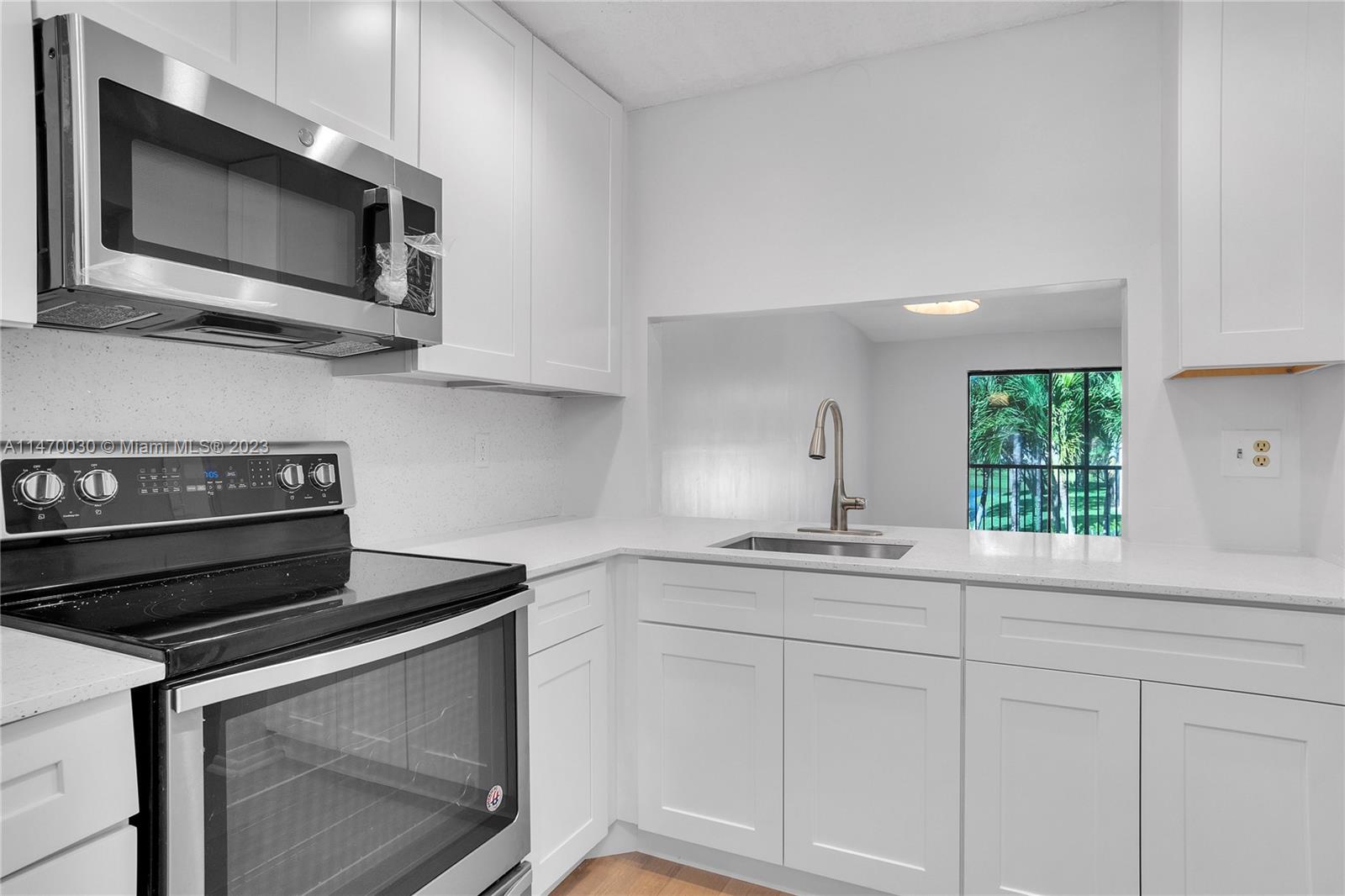 Amazing 2/2 with Brand new kitchen and baths, new carpeting in bedrooms, FABULOUS VIEW of lake and pool...This 2/2 is the gem you've be waiting for. Washer & Dryer inside the unit. Super quiet condominium with lots of parking space. Unit is on the second floor.