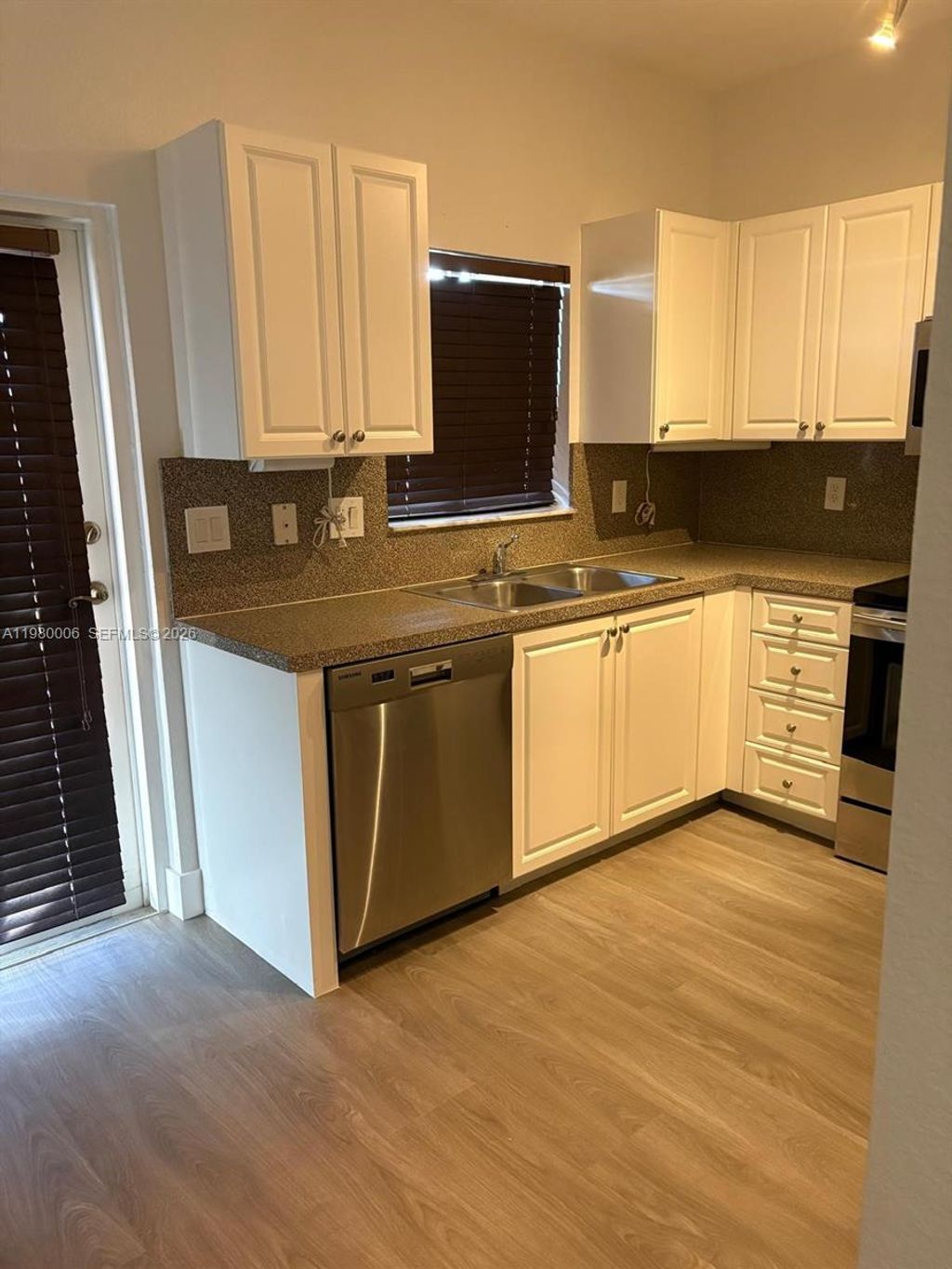 Photo of 11500 NW 33rd St, Sunrise, FL 33323 (MLS # A11980006)