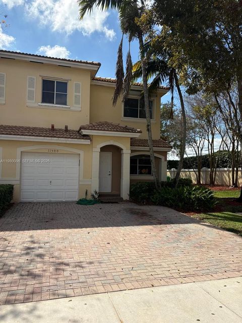 Photo of 11500 NW 33rd St, Sunrise, FL 33323 (MLS # A11980006)