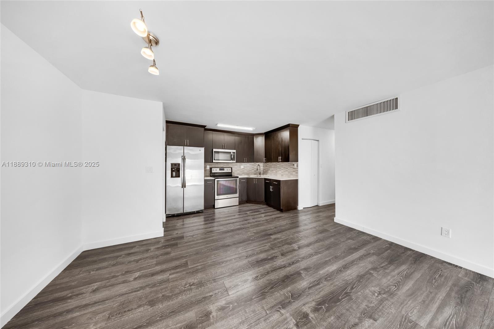 Spacious 2-bedroom, 2-bath unit located in the Doral Gardens community. The association has recently completed new paving throughout, giving the community a clean and updated look. This unit features a comfortable layout with plenty of natural light and great potential for personalization. Centrally located near major highways, shopping centers, schools, and dining, making it an excellent opportunity for both end-users and investors. Community is well-maintained and investor friendly with strong rental demand in the area. Easy to show.