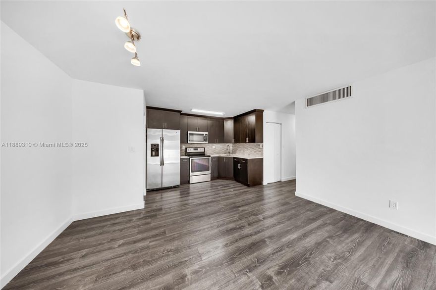Spacious 2-bedroom, 2-bath unit located in the Doral Gardens community. The association has recently completed new paving throughout, giving the community a clean and updated look. This unit features a comfortable layout with plenty of natural light and great potential for personalization. Centrally located near major highways, shopping centers, schools, and dining, making it an excellent opportunity for both end-users and investors. Community is well-maintained and investor friendly with strong rental demand in the area. Easy to show.