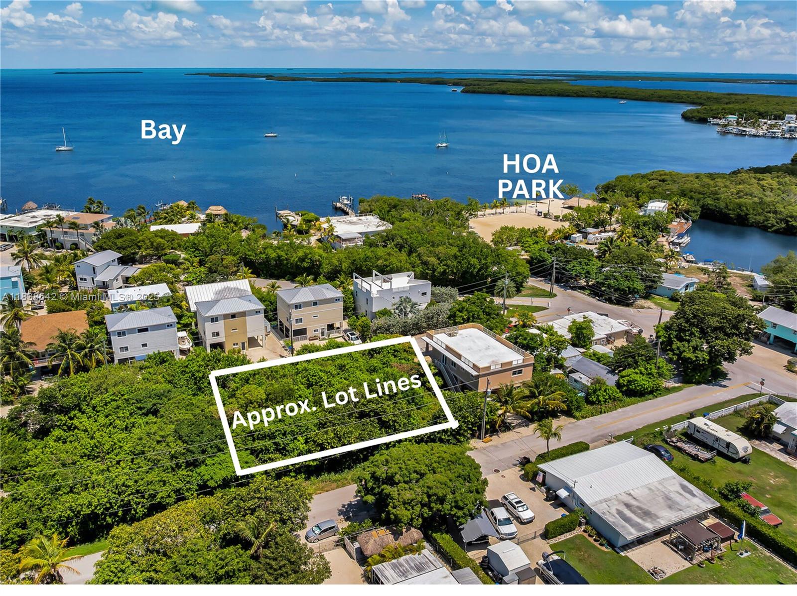 Opportunity knocks! Rare chance to own four contiguous lots in Key Largo Park. Located on Lakeview Dr and Poinciana Dr, these parcels total 10,000 sq. ft. (100' x 100') and stretch from street to street. Each lot is 2,500 sq. ft. (50' x 50'). Seller will consider offers on all four lots (this listing), two lots together, or individually. Surrounded by established homes with bay views from rooftop decks or top floors. Build up to four homes or one large island retreat with space for outdoor living. Enjoy the relaxed Keys lifestyle just a short drive from Miami. Optional membership in the voluntary homeowner’s park includes beach, bayfront, tiki hut, volleyball, and boat ramp access.