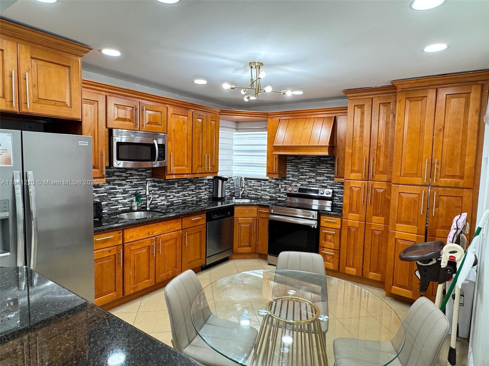 Beautiful clean home all ready to move in. Prime location in a great neighborhood. Heated pool with full privacy from neighbors. Close to houses of worship