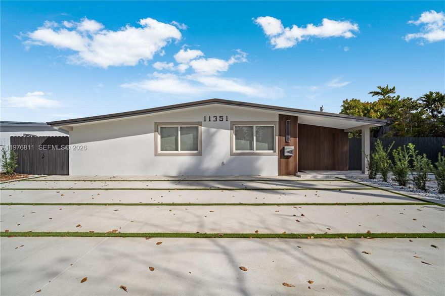 Very rare & oversized detached living quarters 1/1! There is also another efficiency attached to the home with it’s own entrance and bathroom! The efficiency can be part of the home or closed off. Actual sq ft. 2043. This home has been totally remodeled giving you a new construction experience without the big price tag! We have a brand new roof & new impact windows all done with permits! The only thing that is original is the concrete! Every single imaginable detail has been upgraded and tastefully remodeled. We have new floors, enormous modern driveway, kitchen, electrical, plumbing, lighting, appliances, built in closets, bathrooms and more. All work done is of high quality workmanship and materials! Nothing to cut corners. You can have a 3b / 2ba Main house + Efficieny + 1/1 completely separate living quarters or a 4b / 3ba main home + the 1/1 detatched living quarters. Huge lot with plenty of space to add a large pool or park a very large boat etc. *** Inspection has determined some cast iron piping still remains. The main home has impact windows, the additional unit has standard windows, shutters will be provided for those 3 windows in the additioanl unit.***