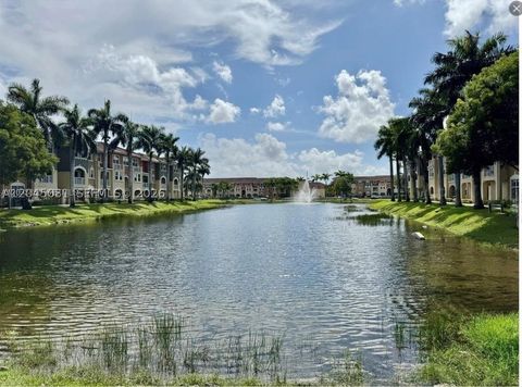 Photo of 10885 NW 89th Ter #203, Doral, FL 33178 (MLS # A12045031)