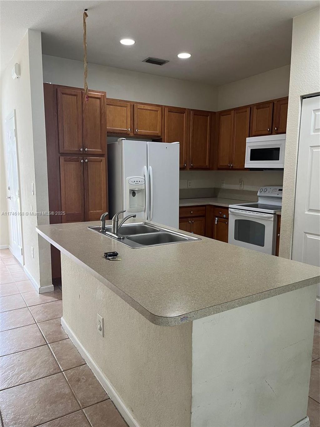 Photo of 6716 Cypress Walk Ter #6716, Tamarac, FL 33321 (MLS # A11746168)