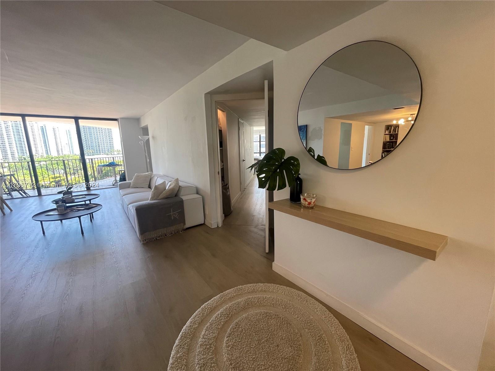 This is a 3 BEDROOM/3 BATHROOM condo at Biscayne Cove, off of William Island Blvd. Unit features an open floor plan, floor to ceiling windows, formal dining room, lots of closet space. New Vinyl floor installed in rooms/living room. Open balcony to beautiful sunrise/sunset. Amenities include 2 pools, jacuzzi, tennis courts, handball/paddle court. a+ School District. Walking to plazas, restaurants, shopping, child park & synagogues.