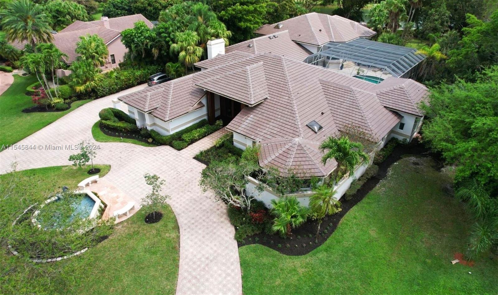 Property for Sale at 7700 S Woodridge Dr, Parkland, Broward County, Florida - Bedrooms: 5 
Bathrooms: 8  - $3,650,000