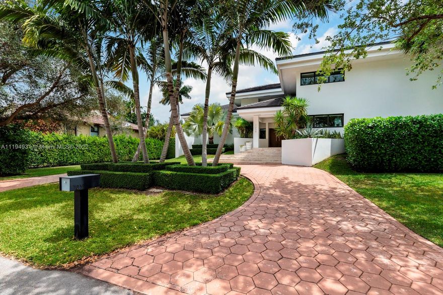 Step inside this impeccably renovated + maintained home in the gated community of Cocoplum. This multi-level, 5-bedroom home welcomes you with a dramatic entrance that is soaked in natural light. The heart of the home is the stunningly remodeled kitchen w/ an expansive island, hidden walk-in pantry + bar area. Viking + Subzero appliances are found throughout, including a 100-bottle wine cooler. The backyard is a tranquil oasis w/ full entertainment area + outdoor shower.  Additional features include a smart home system with Sonos sound, an air conditioned garage, hurricane impact windows + remodeled primary bathroom. Both the roof + electrical were replaced in 2016. Not to be missed is the bonus basement area, equipped w/ a gym + additional bed + bath.