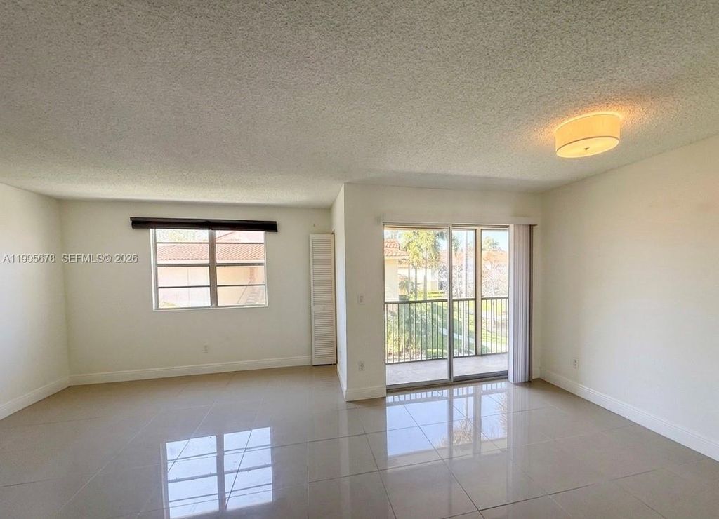 Photo of 1253 SW 46th Ave #1608, Pompano Beach, FL 33069 (MLS # A11995678)