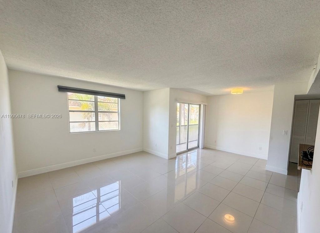 Photo of 1253 SW 46th Ave #1608, Pompano Beach, FL 33069 (MLS # A11995678)
