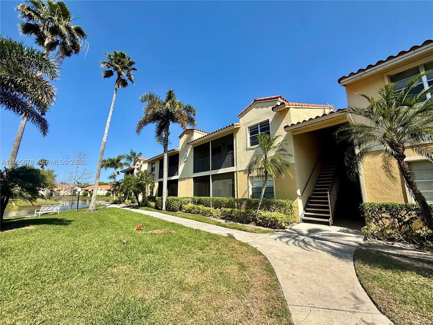 1-bedroom, 1-bathroom condo with 785 sq ft of living space at Royal Poinciana Condominium. Unit has been recently painted and features a spacious layout. Includes washer and dryer in unit and additional storage on the balcony. Gated community with amenities including gym and community pool. Quiet community with open views. Easy to show!