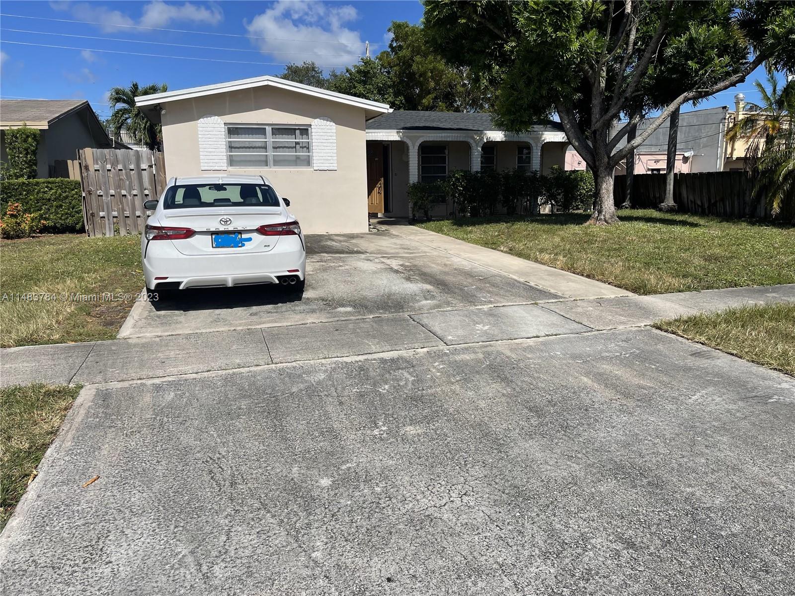2 bed/2 bath pool home in Hollywood .. close to the beach, 95, downtown Hollywood and shopping. This house has a large updated kitchen with an eat in/dining area on one side and a separate office area on the other side. Washer/Dryer is included. Pool and backyard are spacious - Pool has been resurfaced with new tile & diamond brite. Use of the outside shed is allowed. Vanities in bathrooms have been updated. Master has pool view, backyard access and walk in closet. Ceiling fans in the bedrooms and throughout. Central AC throughout. Bonus enclosed sun room with amazing window views of the pool and backyard. Pets are allowed. Plenty of parking near the home and in the driveway which can hold 4 cars. Home wil be cleaned before move in. Ready for immediate move in. Great for a family.
