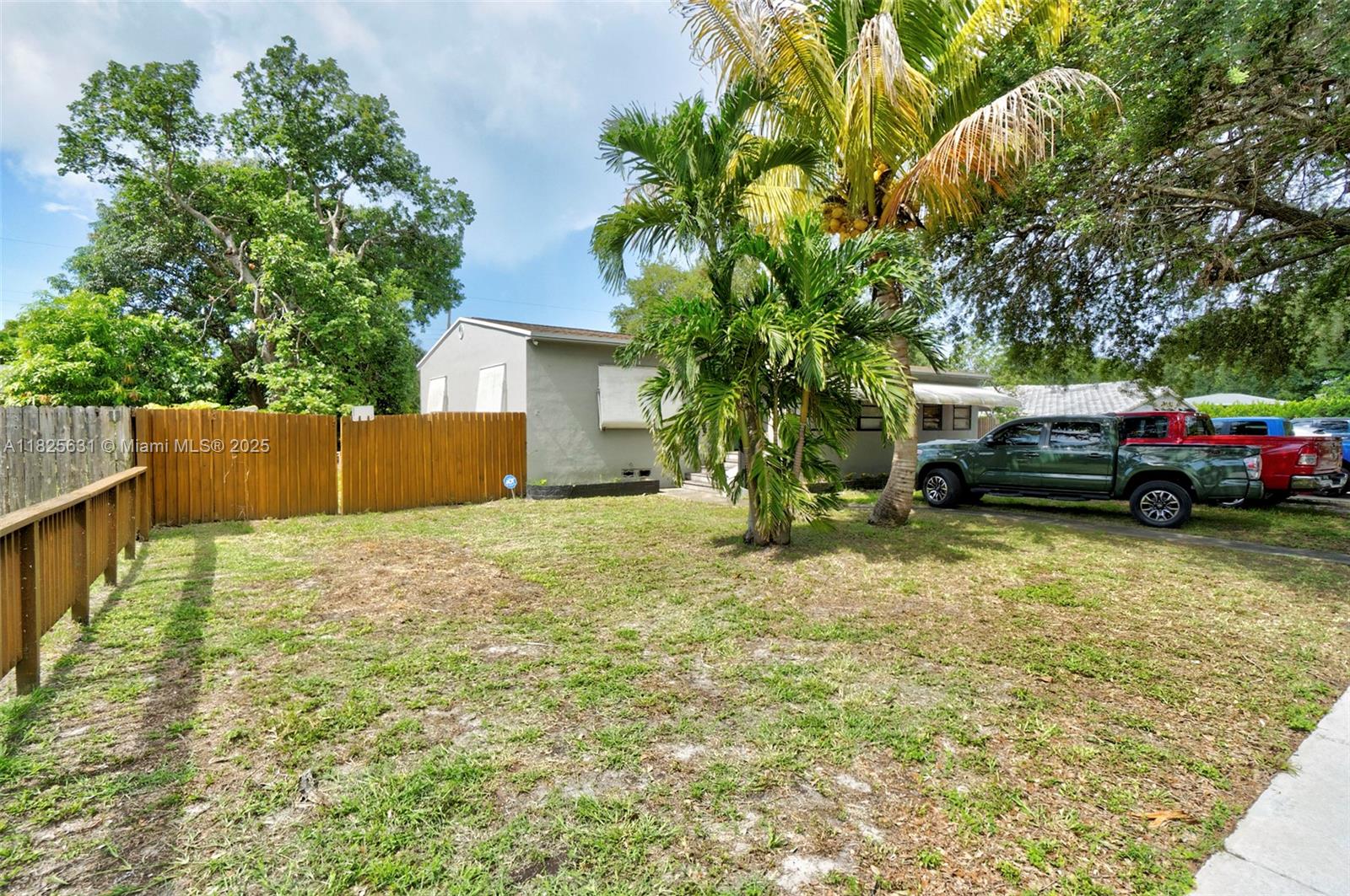 Charming 3BR/2BA Home on Oversized 12,000+ Sq Ft Lot! This property sits on a spacious, fully fenced lot featuring an extra-large shed, separate workshop, and a large concrete pad—perfect for boat or RV storage. The backyard also offers a variety of mature fruit trees and a peaceful setting. Wheelchair accessible through the backyard. Inside, the home needs some TLC but offers great potential to make it your own. Recent upgrades include a 7-year-old roof, 3-year-old A/C, 1-year-old gas water heater, and a water filtration system. Septic tank was cleaned just 3 years ago. A rare find with space, updates, and endless possibilities!