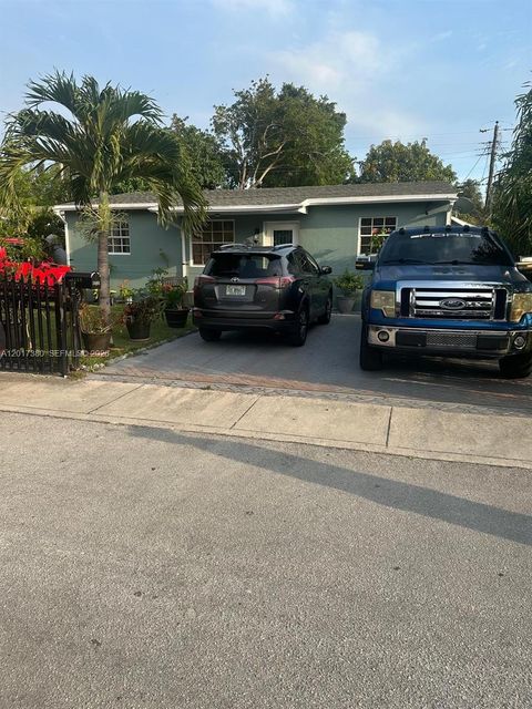 Photo of 1560 NE 154th St, North Miami Beach, FL 33162 (MLS # A12017380)