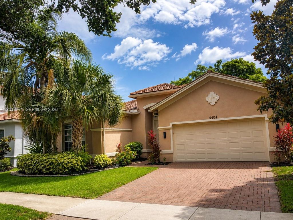 Photo of 4404 E Whitewater Ave, Weston, FL 33332 (MLS # A12018771)